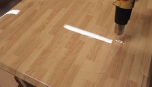 Pop Air Bubbles with a Plumber’s Torch or Heat Gun